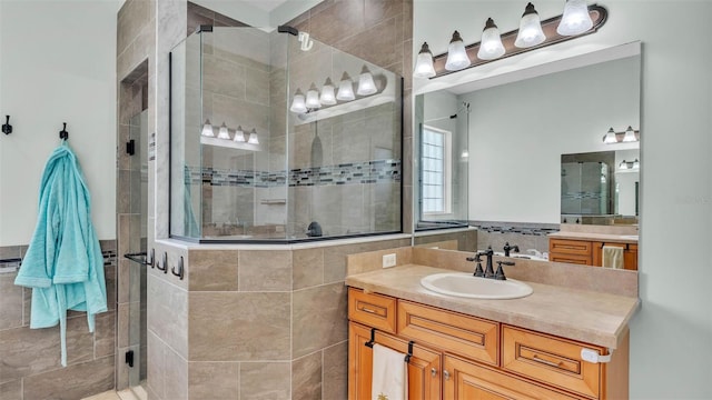 6757 High Grove Dr, Lakeland, FL 33813 - full bath with a shower stall, vanity, and tile walls