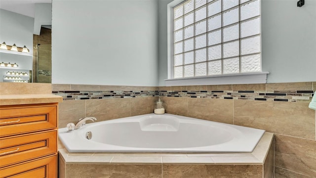 6757 High Grove Dr, Lakeland, FL 33813 - bathroom featuring vanity and a garden tub