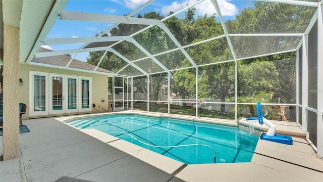 6757 High Grove Dr, Lakeland, FL 33813 - swimming pool with french doors, a patio area, and a lanai
