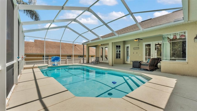 6757 High Grove Dr, Lakeland, FL 33813 - outdoor pool with french doors, a patio, and glass enclosure