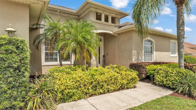 6757 High Grove Dr, Lakeland, FL 33813 - property entrance with stucco siding