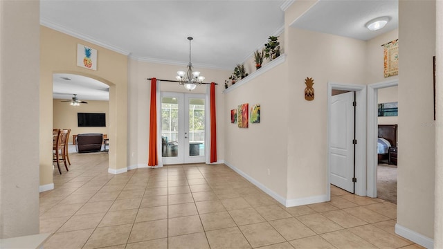 6757 High Grove Dr, Lakeland, FL 33813 - entryway featuring light tile patterned flooring, french doors, ceiling fan, crown molding, and a chandelier