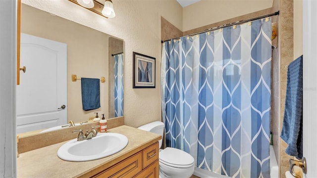 6757 High Grove Dr, Lakeland, FL 33813 - bathroom featuring a textured wall, vanity, and a shower with shower curtain