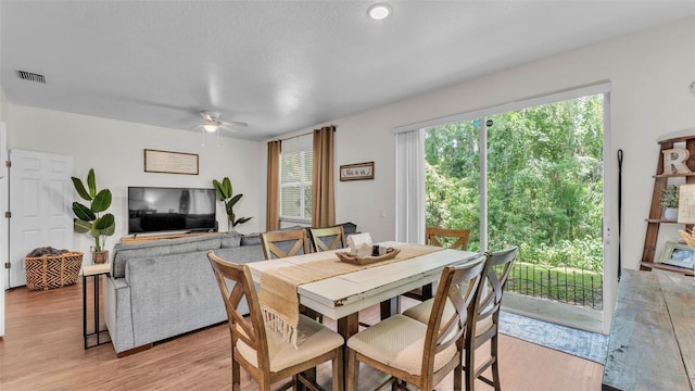 6365 Torrington Cir, Lakeland, FL 33811 - dining room with ceiling fan and light wood finished floors
