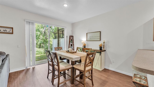 6365 Torrington Cir, Lakeland, FL 33811 - dining area with wood finished floors