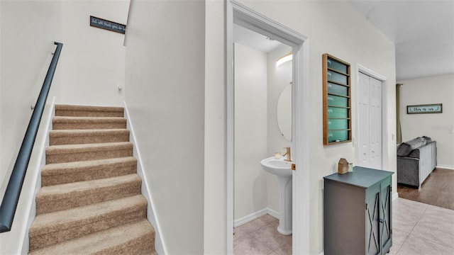 6365 Torrington Cir, Lakeland, FL 33811 - stairs featuring tile patterned flooring and baseboards