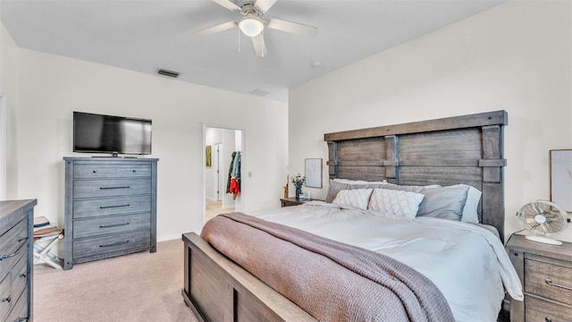 6365 Torrington Cir, Lakeland, FL 33811 - bedroom with light carpet and a ceiling fan