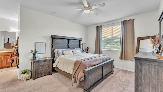 6365 Torrington Cir, Lakeland, FL 33811 - bedroom featuring light carpet, a ceiling fan, and ensuite bathroom