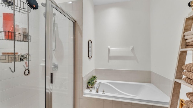 6365 Torrington Cir, Lakeland, FL 33811 - full bathroom with a bath and a shower stall