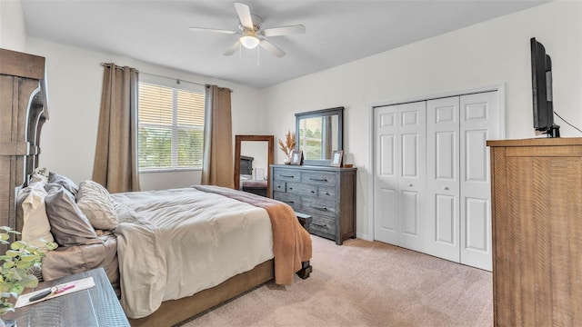 6365 Torrington Cir, Lakeland, FL 33811 - bedroom with light carpet, a closet, and ceiling fan