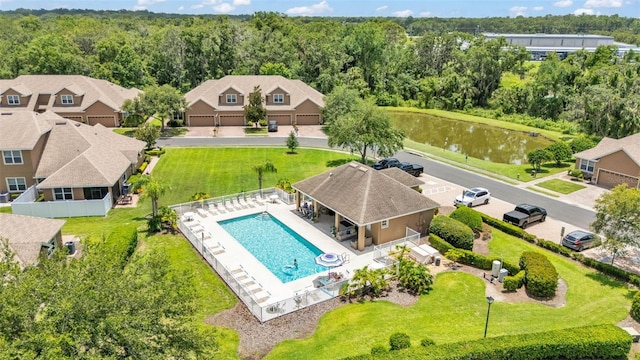 6365 Torrington Cir, Lakeland, FL 33811 - drone / aerial view of a pool area and a nearby body of water