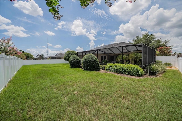 2026 Indian Sky Cir, Lakeland, FL 33813 - fenced backyard with a lanai