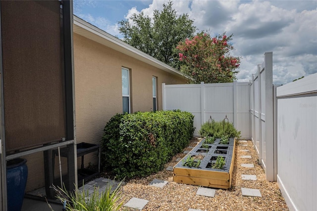 2026 Indian Sky Cir, Lakeland, FL 33813 - view of yard featuring a vegetable garden