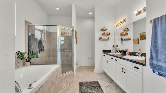 1028 15th St NE, Winter Haven, FL 33881 - bathroom featuring double vanity, a stall shower, a bath, and recessed lighting