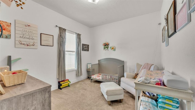 1028 15th St NE, Winter Haven, FL 33881 - carpeted bedroom with baseboards and a textured ceiling