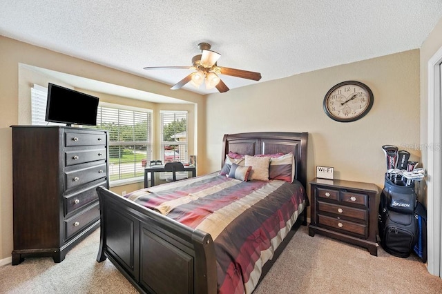 1420 Meadows Pond Dr, Bartow, FL 33830 - bedroom with light carpet, a textured ceiling, and a ceiling fan