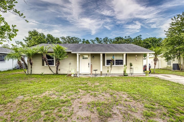 2443 Delrose Dr E, Lakeland, FL 33805 - ranch-style home featuring a front yard and a porch