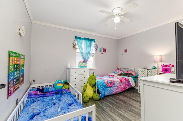 2443 Delrose Dr E, Lakeland, FL 33805 - bedroom featuring crown molding, wood finished floors, and ceiling fan