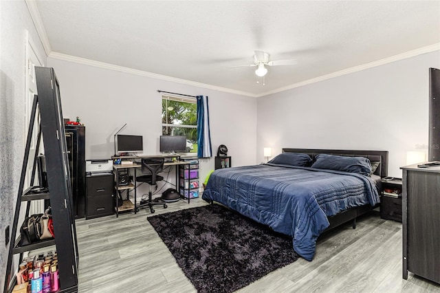 2443 Delrose Dr E, Lakeland, FL 33805 - bedroom with light wood finished floors, crown molding, an office area, and ceiling fan