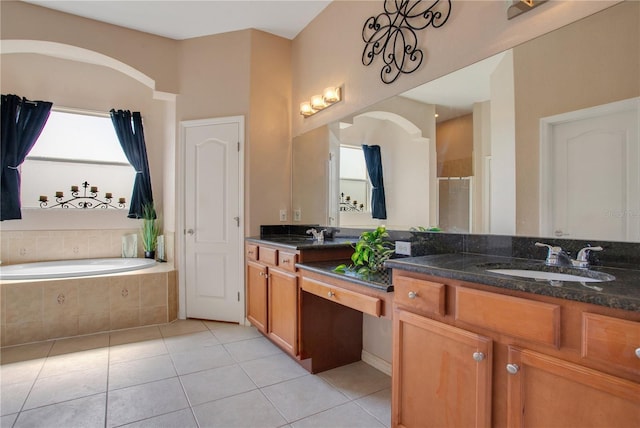 5370 Knights Station Rd, Lakeland, FL 33810 - bathroom with tile patterned floors, double vanity, a bath, and a shower