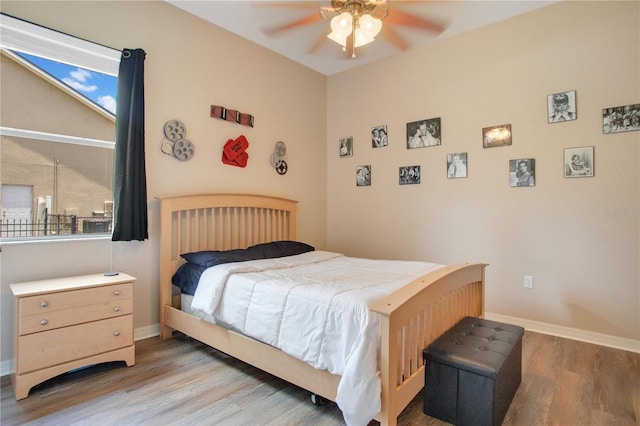 5370 Knights Station Rd, Lakeland, FL 33810 - bedroom with wood finished floors and ceiling fan