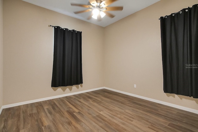 5370 Knights Station Rd, Lakeland, FL 33810 - spare room with dark wood-type flooring, ceiling fan, and lofted ceiling