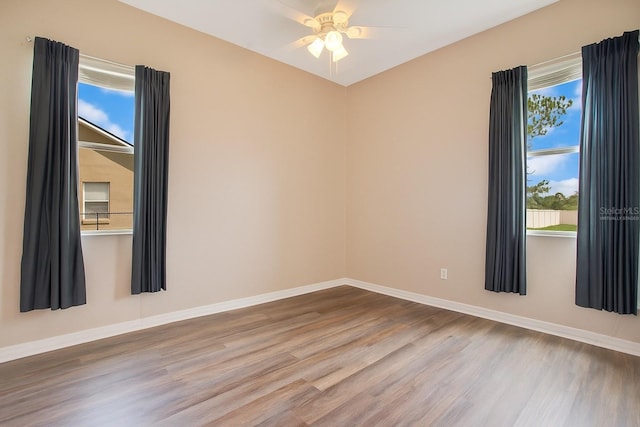 5370 Knights Station Rd, Lakeland, FL 33810 - empty room with wood finished floors and a ceiling fan