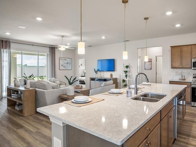 7515 SW 107th Ln, Ocala, FL 34476 - kitchen with open floor plan, dark wood-type flooring, appliances with stainless steel finishes, recessed lighting, and a ceiling fan