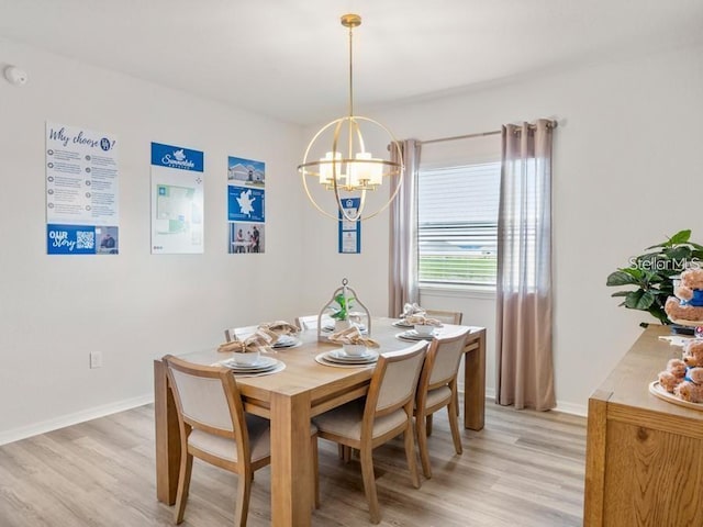 7515 SW 107th Ln, Ocala, FL 34476 - dining room featuring a chandelier and light wood-type flooring
