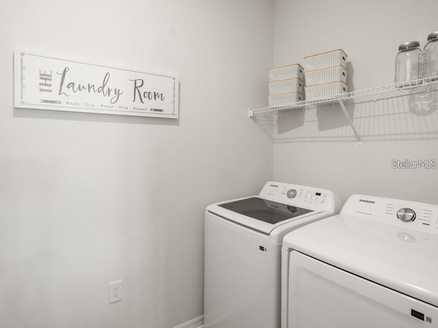7515 SW 107th Ln, Ocala, FL 34476 - laundry room with washer and clothes dryer