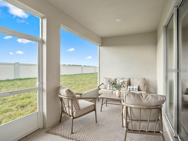 7515 SW 107th Ln, Ocala, FL 34476 - sunroom / solarium with plenty of natural light and carpet floors