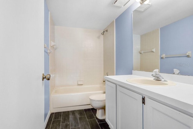 8818 Tottenham Way, Kissimmee, FL 34747 - full bathroom featuring vanity, tub / shower combination, and wood finished floors