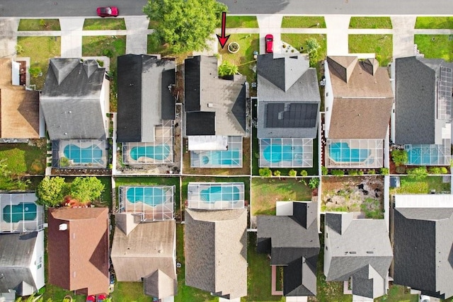 8818 Tottenham Way, Kissimmee, FL 34747 - aerial perspective of suburban area with a pool and property parcel outlined