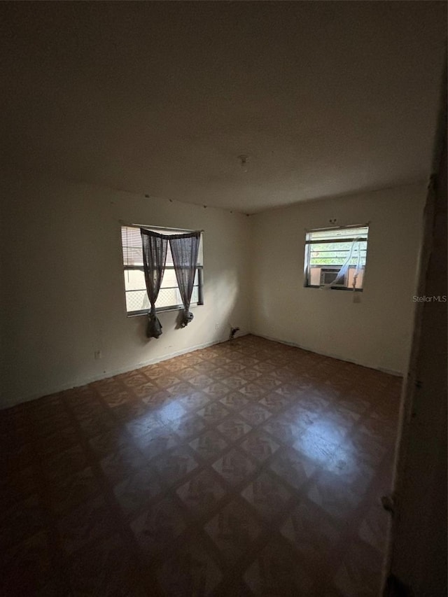 2921 Galaxy Ln, Lakeland, FL 33801 - spare room featuring tile patterned floors