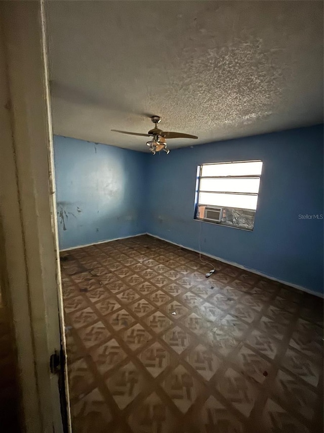 2921 Galaxy Ln, Lakeland, FL 33801 - empty room with a ceiling fan, a textured ceiling, and cooling unit