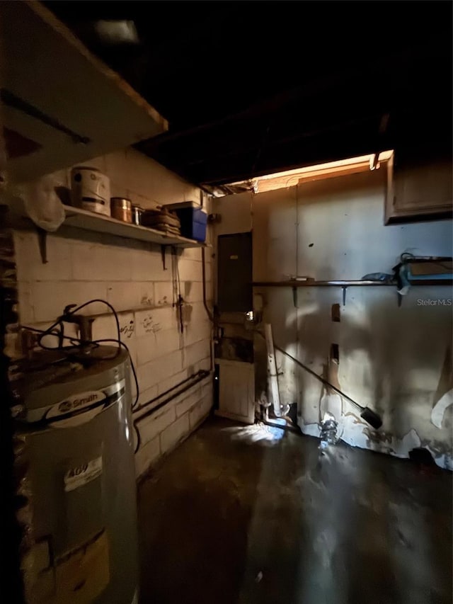 2921 Galaxy Ln, Lakeland, FL 33801 - basement featuring water heater and concrete block wall