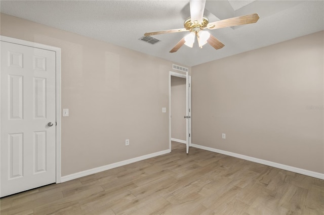 1125 Blackjack Ridge St, Minneola, FL 34715 - unfurnished bedroom with light wood-type flooring and a ceiling fan
