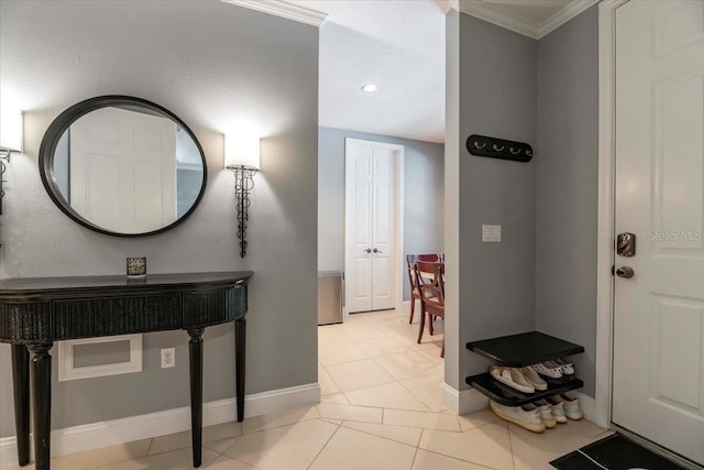 3608 54th Dr W Unit 202, Bradenton, FL 34210 - bathroom with ornamental molding and tile patterned floors