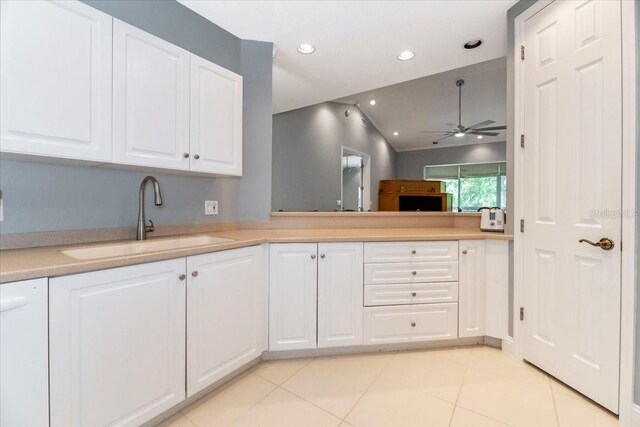 3608 54th Dr W Unit 202, Bradenton, FL 34210 - kitchen featuring a ceiling fan, white cabinetry, light countertops, lofted ceiling, and recessed lighting