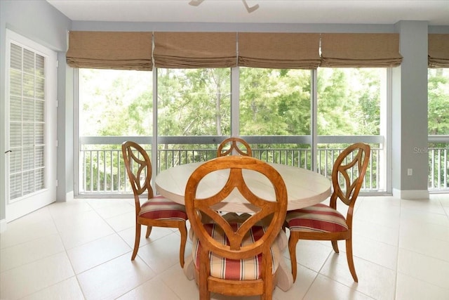 3608 54th Dr W Unit 202, Bradenton, FL 34210 - sunroom / solarium featuring a ceiling fan and outdoor dining area