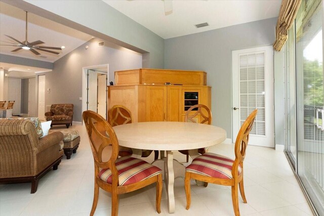 3608 54th Dr W Unit 202, Bradenton, FL 34210 - dining space featuring ceiling fan and light tile patterned flooring