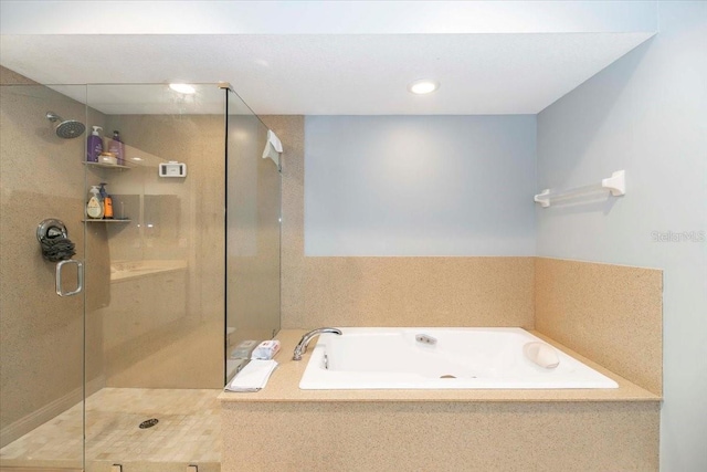 3608 54th Dr W Unit 202, Bradenton, FL 34210 - bathroom featuring a stall shower and a bath