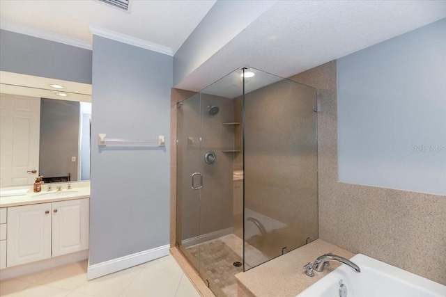 3608 54th Dr W Unit 202, Bradenton, FL 34210 - bathroom featuring ornamental molding, a stall shower, vanity, a garden tub, and tile patterned floors
