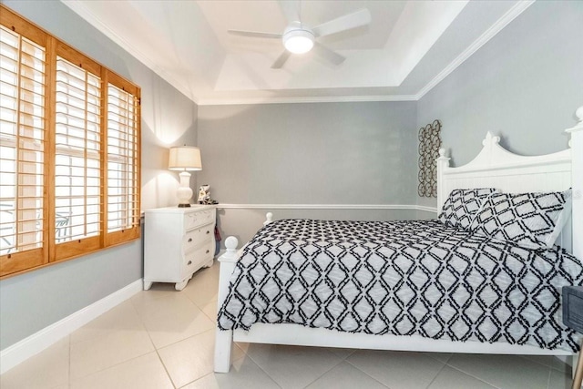 3608 54th Dr W Unit 202, Bradenton, FL 34210 - bedroom featuring a raised ceiling, ornamental molding, light tile patterned floors, and a ceiling fan