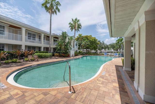 3608 54th Dr W Unit 202, Bradenton, FL 34210 - community pool with a patio area