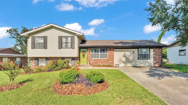 4908 Celia Cir W, Lakeland, FL 33813 - split level home with brick siding, a front lawn, and concrete driveway