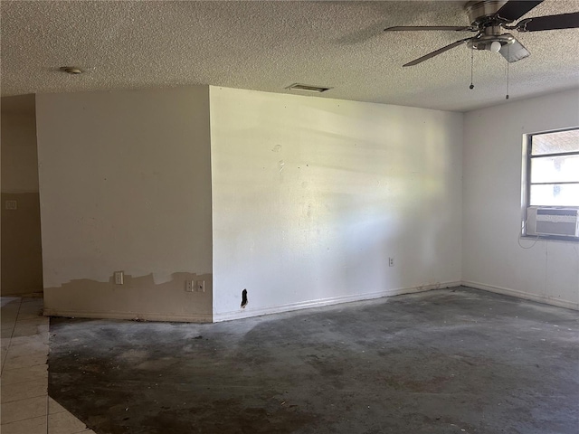 2250 Maple Hill Dr, Lakeland, FL 33811 - empty room with ceiling fan, concrete flooring, a textured ceiling, and cooling unit