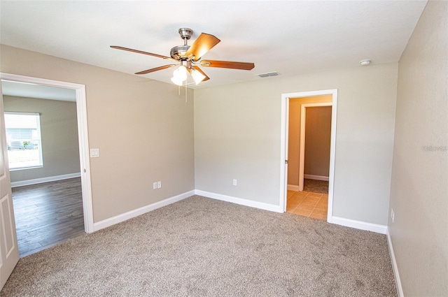 4042 Old Bartow Eagle Lake Rd, Bartow, FL 33830 - carpeted spare room with ceiling fan and baseboards