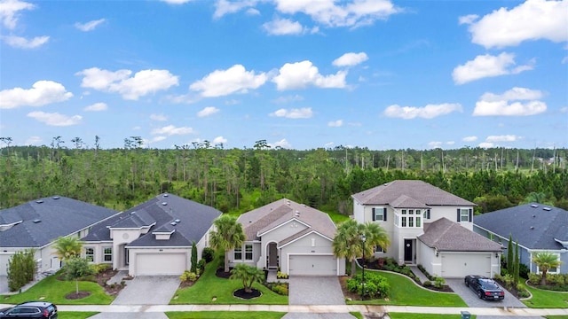 180 Azure Mist Way, Daytona Beach, FL 32124 - aerial view of residential area featuring a heavily wooded area