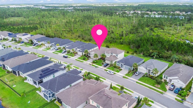 180 Azure Mist Way, Daytona Beach, FL 32124 - aerial view of residential area with a heavily wooded area